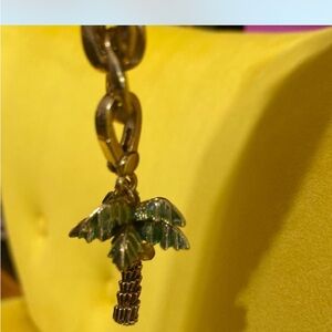 Retired Juicy Couture palm tree charm.